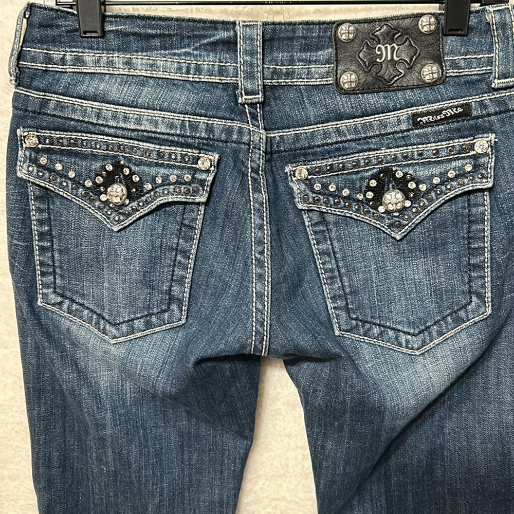 Miss Me low rise, distressed bling pocket boot cut jeans, size 28